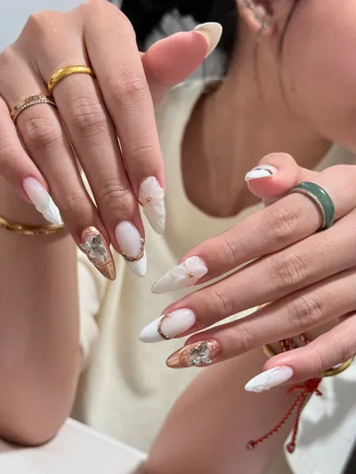 Featured manicure — rose-gold butterfly art