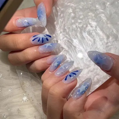 Hand-painted candy stripes on natural nails